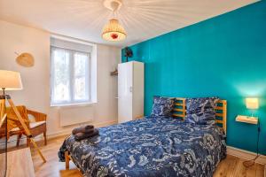 Postel nebo postele na pokoji v ubytování Le petit Studio proche gare