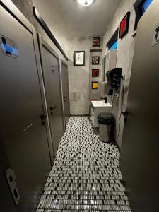 a bathroom with a toilet and a sink at Nomad Hostel Karaköy in Istanbul