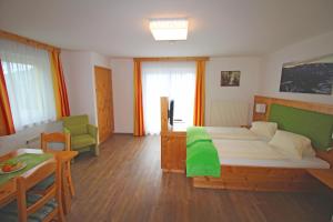 Postel nebo postele na pokoji v ubytování Hotel Käferhube