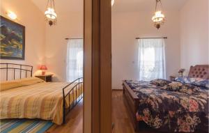 Łóżko lub łóżka w pokoju w obiekcie Holiday Home Mio Persan Cr