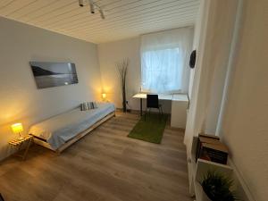 Postel nebo postele na pokoji v ubytování Ferienwohnung komham