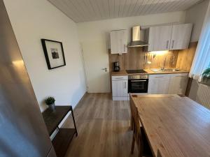 Kuchyň nebo kuchyňský kout v ubytování Ferienwohnung komham + 12 fotografií