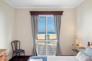 Postel nebo postele na pokoji v ubytování Casa Carlota by Atlântica