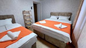 Postel nebo postele na pokoji v ubytování Akelvani Guest House