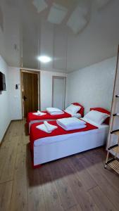 Postel nebo postele na pokoji v ubytování Akelvani Guest House