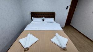Postel nebo postele na pokoji v ubytování Akelvani Guest House