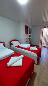 Postel nebo postele na pokoji v ubytování Akelvani Guest House