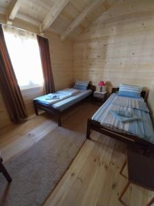 Postel nebo postele na pokoji v ubytování Rent a rooms - "Laki"