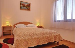 Łóżko lub łóżka w pokoju w obiekcie Apartment Crnja Luka Cr
