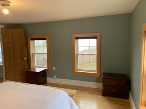 Postel nebo postele na pokoji v ubytování Venture in Adventure!