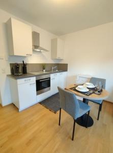Dapur atau dapur kecil di Staufer-Apartment