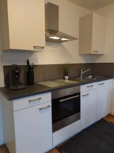 Dapur atau dapur kecil di Staufer-Apartment +5 gambar