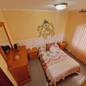 Katil atau katil-katil dalam bilik di Chalet Playa Chilches