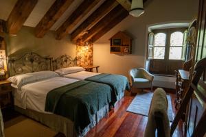 Postel nebo postele na pokoji v ubytování Casa María Berna