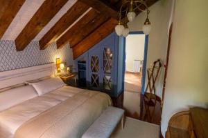 Postel nebo postele na pokoji v ubytování Casa María Berna