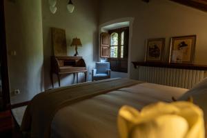 Postel nebo postele na pokoji v ubytování Casa María Berna