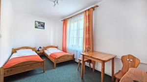 Łóżko lub łóżka w pokoju w obiekcie Villa Medica