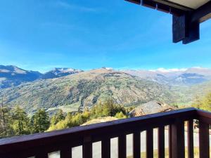 a view of a mountain from a balcony at Résidence Le Sextant - SEXTANT 304 MAE-0871 in La Plagne Tarentaise