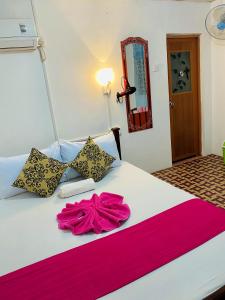 Postel nebo postele na pokoji v ubytování Sigiri Lakshan Home Stay