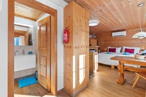 Voodi või voodid majutusasutuse Gemütliches Chalet mit privater Sauna und schöner Aussicht toas
