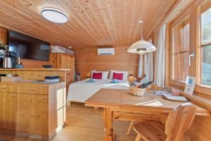 Voodi või voodid majutusasutuse Gemütliches Chalet mit privater Sauna und schöner Aussicht toas