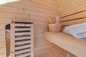 Voodi või voodid majutusasutuse Gemütliches Chalet mit privater Sauna und schöner Aussicht toas