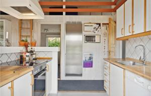 Køkken eller tekøkken på Holiday Home Hejls 20 + 24 billeder