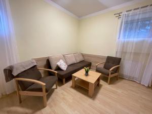 Posedenie v ubytovaní Apartmány Ados