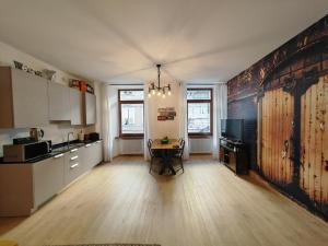 Kuchyň nebo kuchyňský kout v ubytování RivApartmentsDowntowN Urban