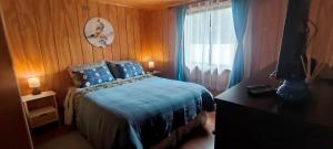 Postel nebo postele na pokoji v ubytování Cabaña Pinos del Mar