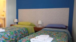 Postel nebo postele na pokoji v ubytování Luna Piena B&B