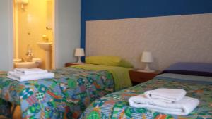 Postel nebo postele na pokoji v ubytování Luna Piena B&B