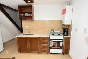 Kuchyň nebo kuchyňský kout v ubytování Cabañas Los Moye