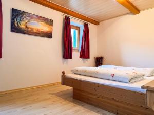 Ένα ή περισσότερα κρεβάτια σε δωμάτιο στο Haus Illmau