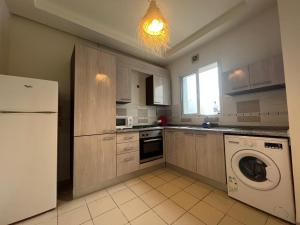 Kuchyň nebo kuchyňský kout v ubytování Appartement top capi