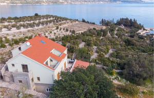 an aerial view of a house with an orange roof at Apartment Kneze With Sea View I in Pupnat +30 photos