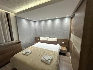 Postel nebo postele na pokoji v ubytování MB Apartmani Kopaonik