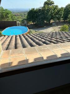 Bazén v ubytování El LABRAO DE ALARDOS nebo v jeho okolí