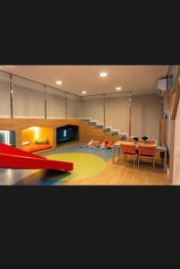 a room with a room with a table and chairs at Move 517 in João Pessoa +23 photos