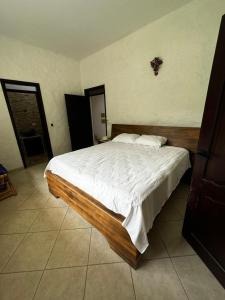 Una cama o camas en una habitación de Finca Las Palmas 2 fotos más