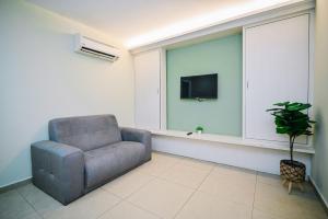 TV a/nebo společenská místnost v ubytování Kingston Hotel 1 - Bukit Bintang