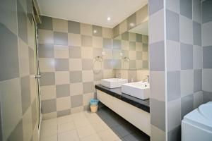 Postel nebo postele na pokoji v ubytování Kingston Hotel 1 - Bukit Bintang