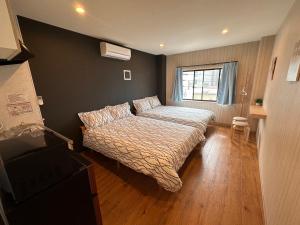 Un pat sau paturi într-o cameră la VanillaHotel-Fukagawa