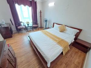 Postel nebo postele na pokoji v ubytování Indochina Airport Hotel Ha Noi
