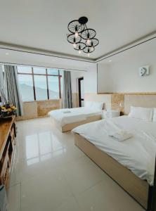 Postel nebo postele na pokoji v ubytování Thúy Hạnh Homestay