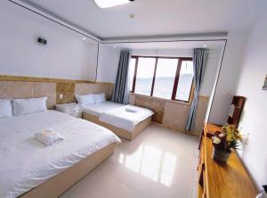 Postel nebo postele na pokoji v ubytování Thúy Hạnh Homestay + 37 fotografií