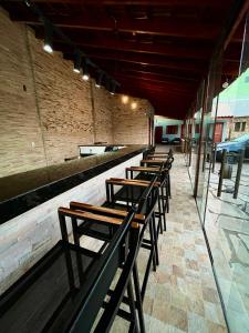 Um restaurante ou outro lugar para comer em Pousada Serra de São Thomé