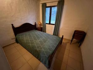 Postel nebo postele na pokoji v ubytování Casa turística Valeria del Mar + 2 fotografie