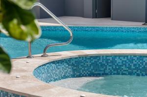 Piscina a Riverdance Apt. 05 o a prop