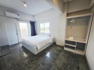 Postel nebo postele na pokoji v ubytování PKK hotel Residence
